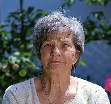 Woman enjoying a healthy daily wellness routine with herbal supplement support